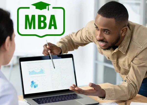 4 Things You Need to Know About MBA in Finance male student working